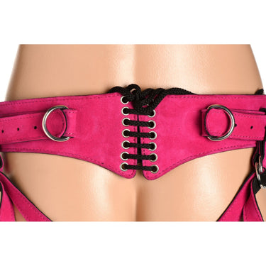 a close up of a woman wearing a pink corset
